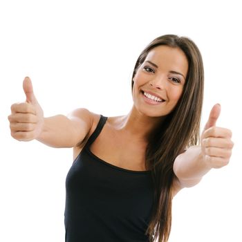 Photo of an excited young female doing the two thumbs up gesture over white background.