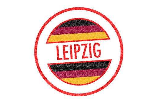 Passport-style LEIPZIG rubber stamp over a white background.