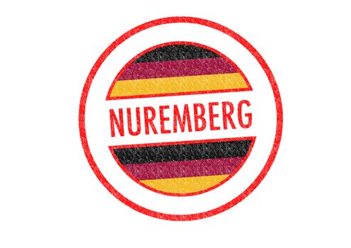 Passport-style NUREMBERG rubber stamp over a white background.