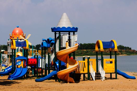 Modern children playground in park without children