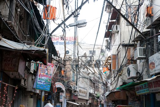OLD DELHI INDIA - 14 AUGUST 2011: Typical Indian risky and chaotic electrical wiring in Old Delhi on October 29 2009. Unsatisfying condition of wiring causes power problems in Delhi.