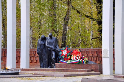 Monument Grieving mother and the young soldier. The monument represents figures of grieving mother and the young soldier with the inclined banner in hands. Near a monument the wall with names of 227 fighters who have died in the Tyumen hospitals was established. It is established in 1955. Sculptor: V. M. Belov