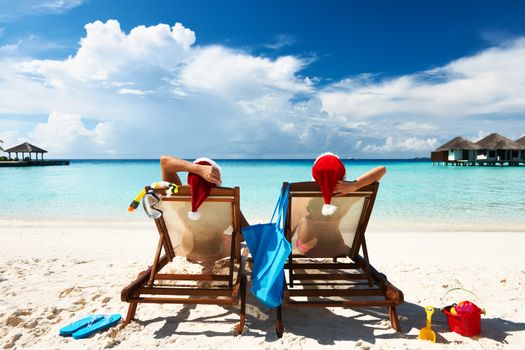 Couple on a tropical beach at Maldives