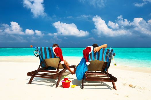 Couple on a tropical beach at Maldives