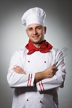 Male chef portrait against grey background