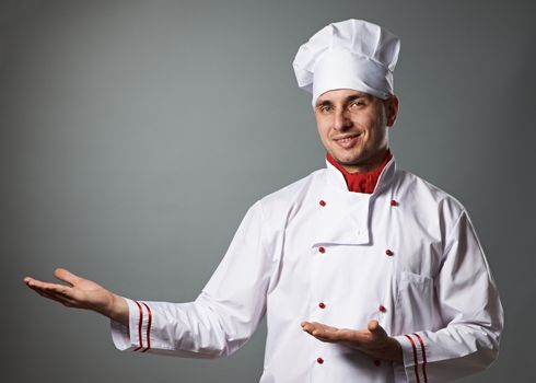 Male chef portrait against grey background