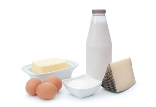 Dairy products and eggs over a white background