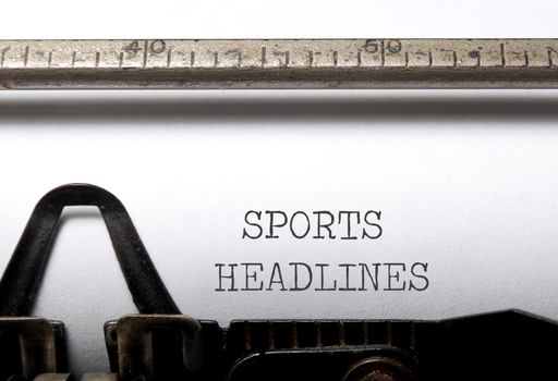 Sports headlines typed on a vintage typewriter 