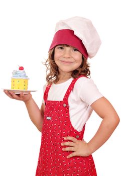 happy little girl cook with sweet colorful cupcake
