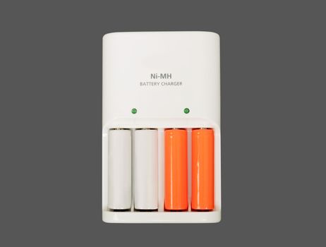 battery charger isolated on gray background - front view