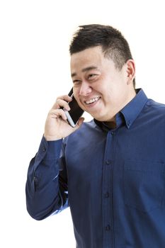 A 3/4 view of a Asian office worker on phone with white isolated background.