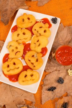 Crispy fried Halloween potato snack, food for a kid party