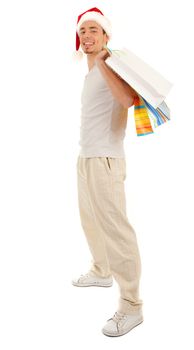 Young Santa with purchases in paper bags on white background