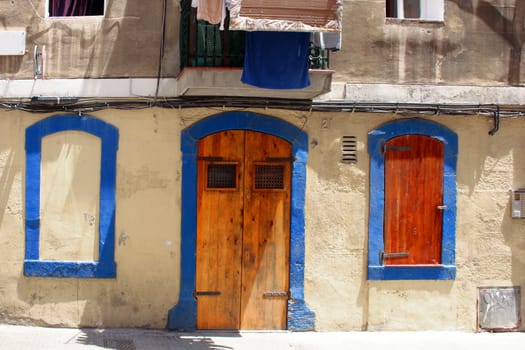 Facade of a blue and white Mediterranean house