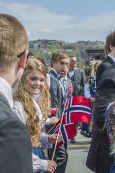 Norwegian Constitution Day is the National Day of Norway and is an official national holiday observed on May 17 each year. This day is also often called the Children's Day. The picture is shot in the center of Halden City.