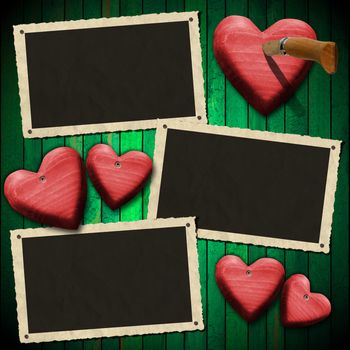 Three aged and romantic photo frames on wooden green background with red hearts and folding knife