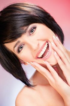 Pretty smiled woman on red background