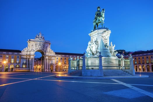 View on the Commerce Square and statue of King Joze I in evening illumination, Lisbon, Portugal. 