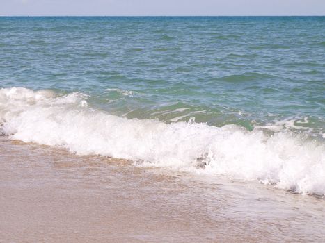 Photo of the Wavy Sea Coast