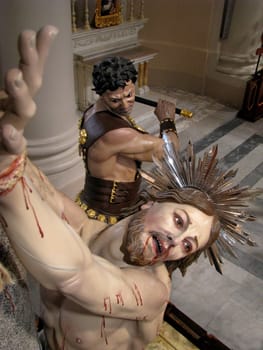 A detail of a statue depicting the flagellation of Jesus in Paola, Malta.