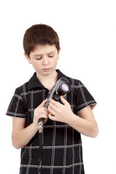 young boy setup old vintage analog 8mm camera 