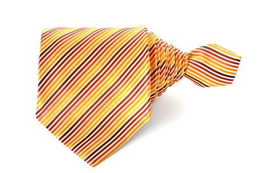 Business tie arranged on white background