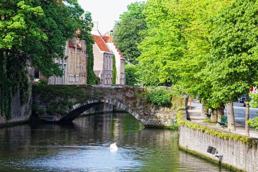 Classic view of channels of Bruges. Belgium. Medieval fairytale city. Summer urban landscape.