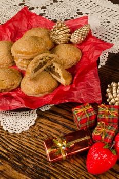 Freshly baked pumpkin cookies surrounded by festive decoration