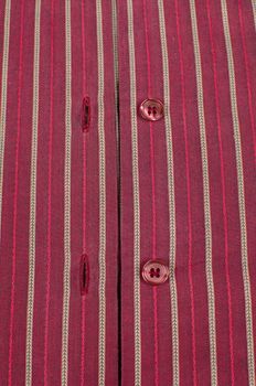 Striped cotton fabric with buttons and buttonholes