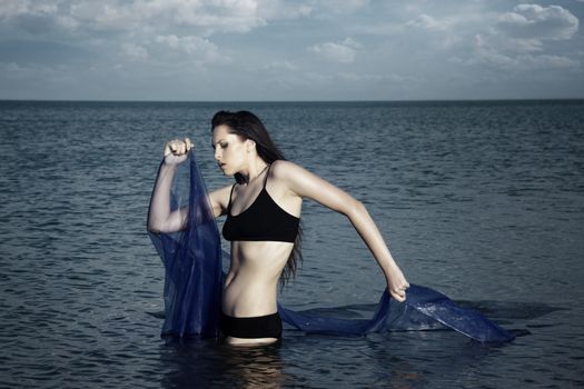 Dramatic photo of the woman in the water
