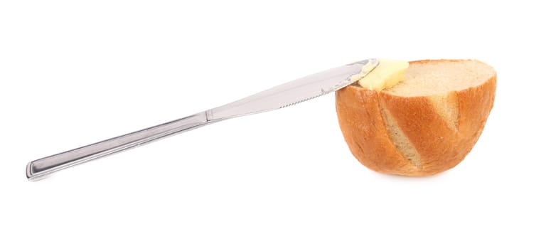 Bread with butter on white background. Close up