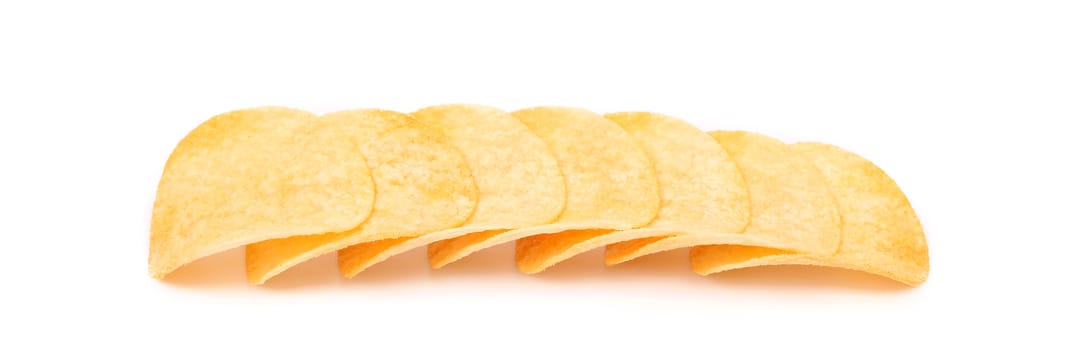 Row of potato chips. Isolated on a white background.