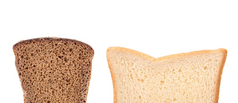 Two slices of white and brown bread