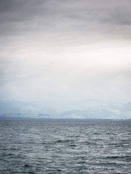 Picture of the lake Bodensee on a very cloudy and rainy day