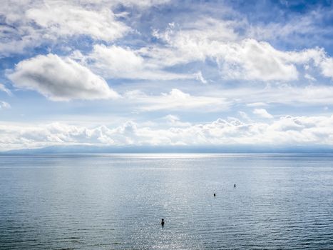 Picture of the lake Bodensee with blue sky and white clouds