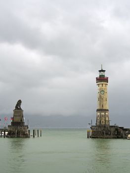 tower and lion at the entrance of the harbor in the german town Lindau at the lake Bodensee