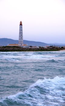 Lighthouse in "Farol" island, in Ria Formosa, natural conservation region in Algarve, Portugal.