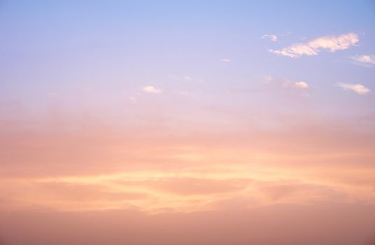 sunlight rays and clouds on the blue sky background