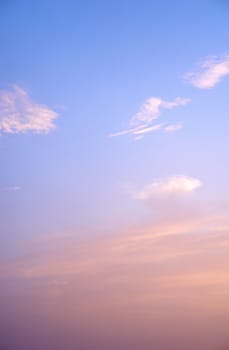 sunlight rays and clouds on the blue sky background