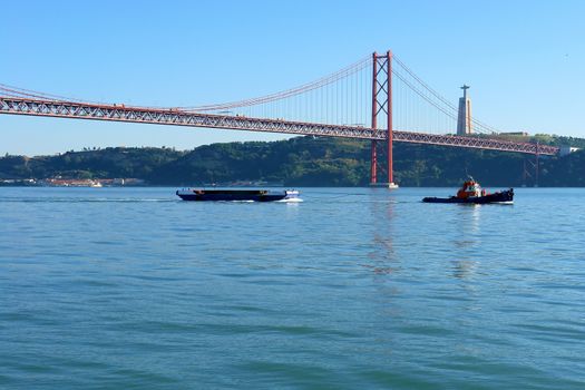  Lisbon, April 25th famous old bridge over river Tejo (Tagus)                     