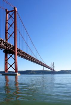  Lisbon, April 25th famous old bridge over river Tejo (Tagus)                     