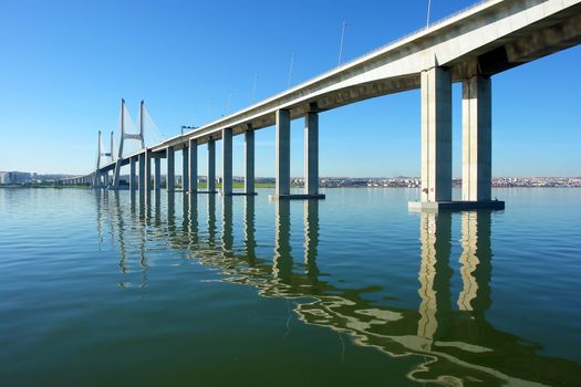 View from river Tagus of Lisbon's "Vasco da Gama" Bridge, Portugal                           