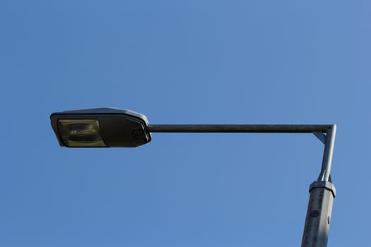 Street lamp under the blue sky
