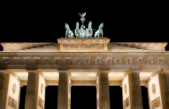 Brandenburg Gate at night, a former city gate and one of the main symbols of Berlin, Germany