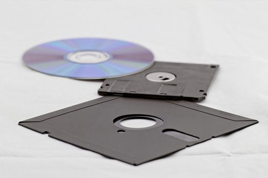 Old Fashion Floppy Disc and Compact Disc ( DVD, CD, CD-RW, DVD-RW )