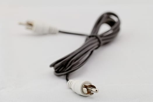 only white audio RCA cable on a white background (right)