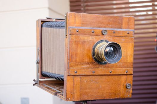 vintage old big wooden photo camera box. retro photography technology.