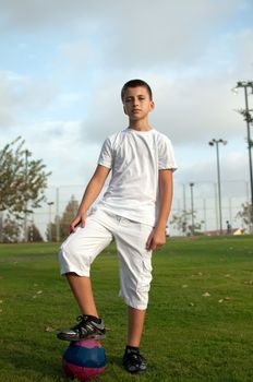 Young  boy with soccer ball .