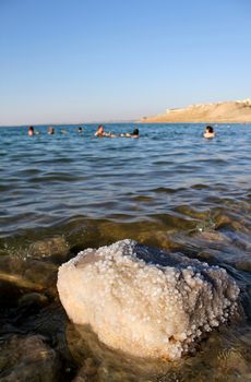 Dead Sea coastline, whit salt crystals and formations in the sand. Jordan