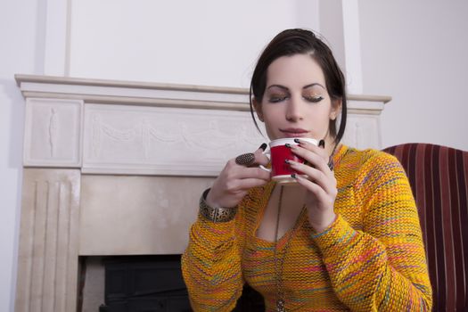 portrait of beautiful woman drinking coffee